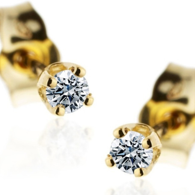 "Puces d'oreilles" en or 750 diamants 0.10 ct environ